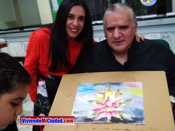 Joel Ramos en el Dia Munidal Pintor Boca y Pie